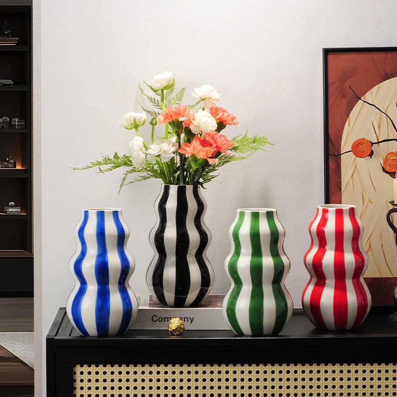 Modern niche minimalist striped vases, flower arrangements in them, high-end sense, creative retro painted ceramic vases