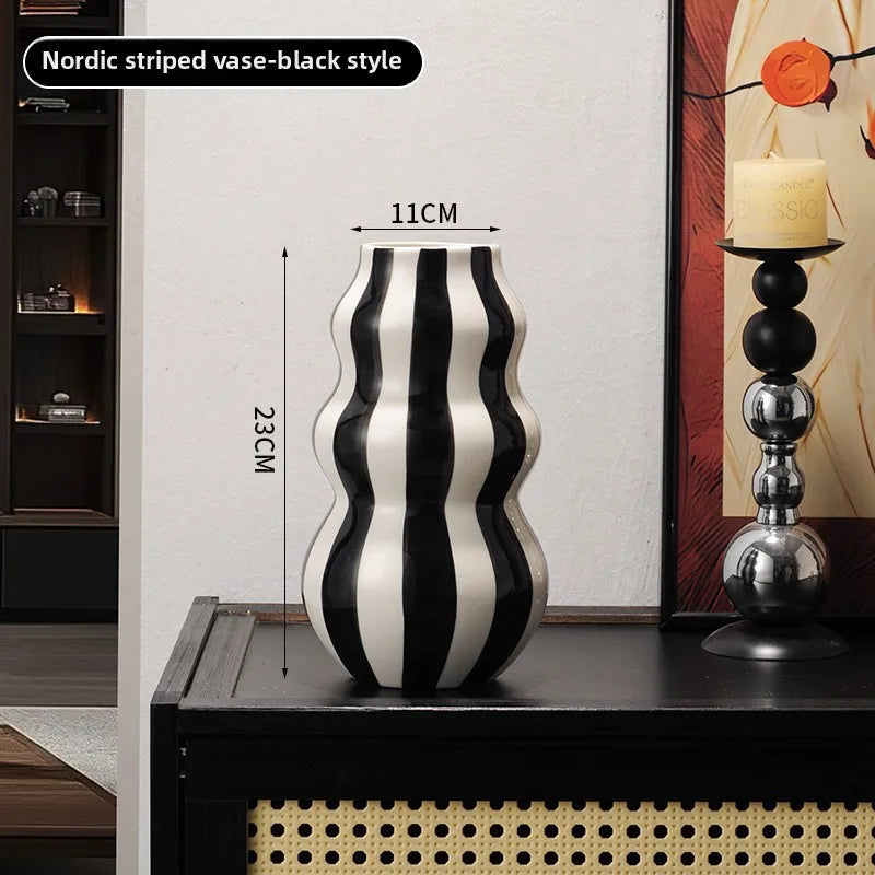 Modern niche minimalist striped vases, flower arrangements in them, high-end sense, creative retro painted ceramic vases